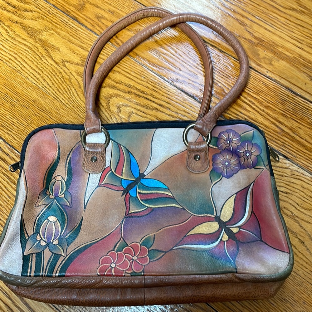 Anuschka  genuine leather purse.  Butterfly and floral print hand painted.